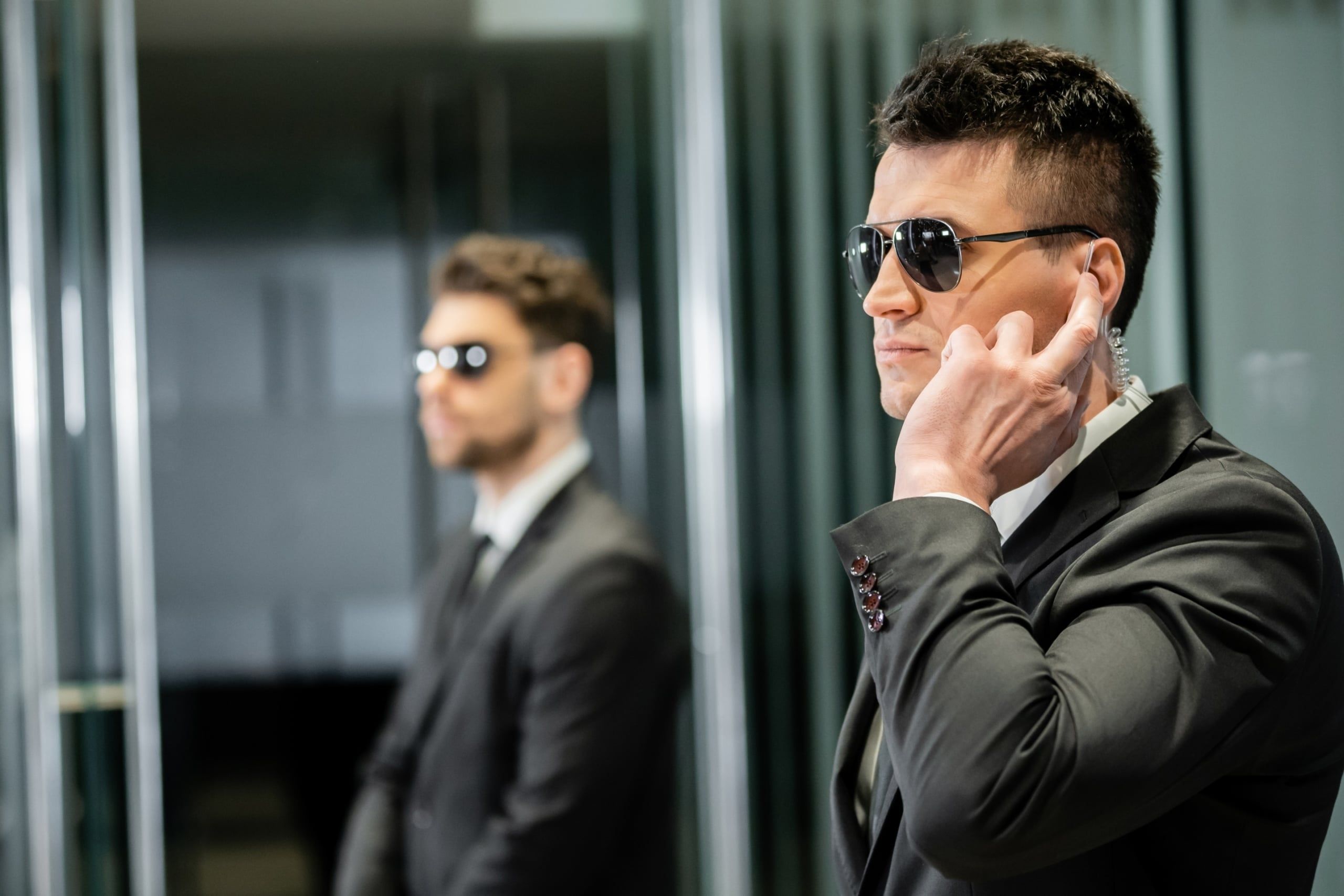 Bodyguard,Service,,Private,Security,,Professional,Guards,In,Suits,And,Sunglasses