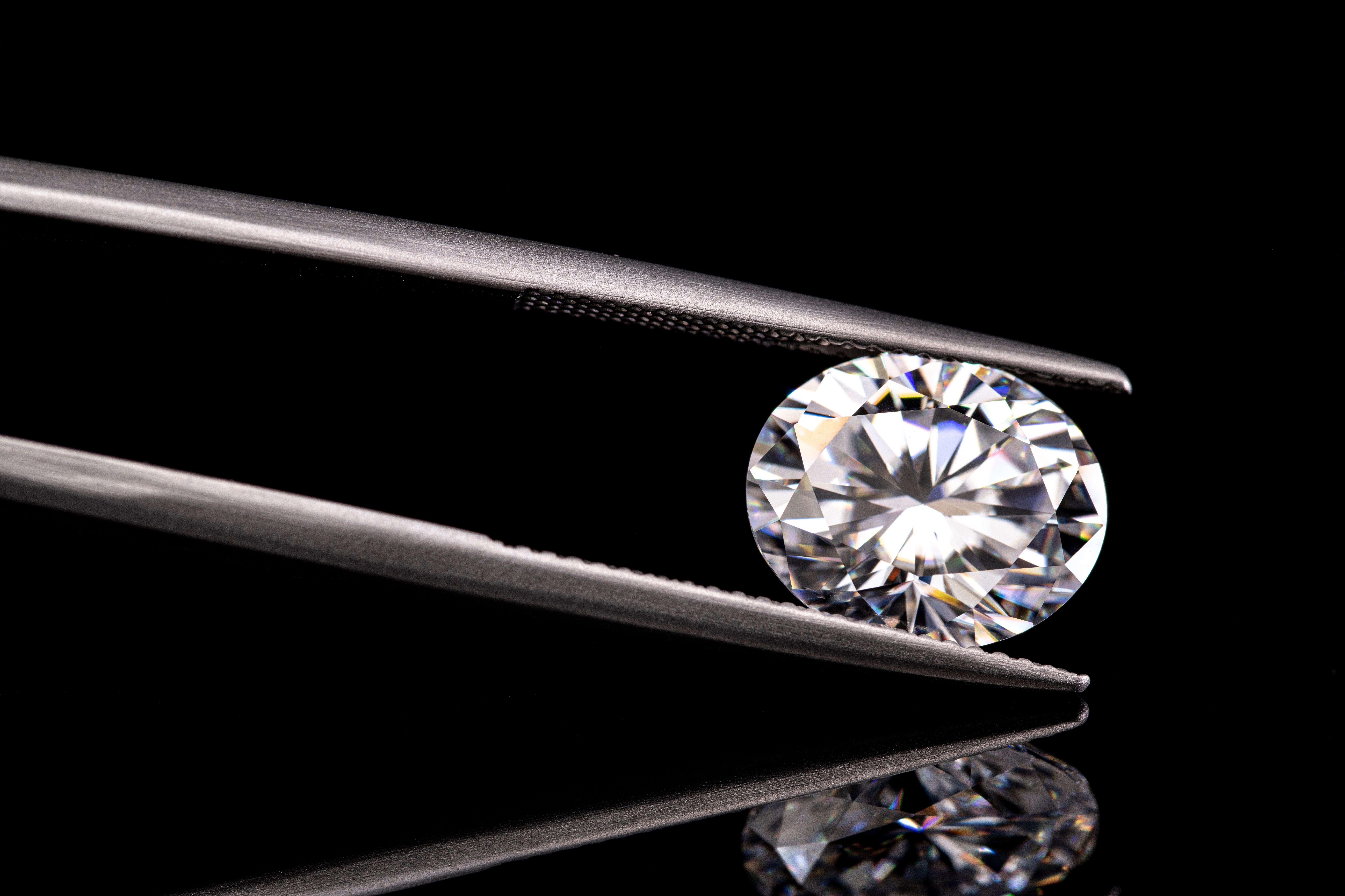 A,Diamond,Is,Displayed,In,A,Diamond,Setting.,The,Diamond