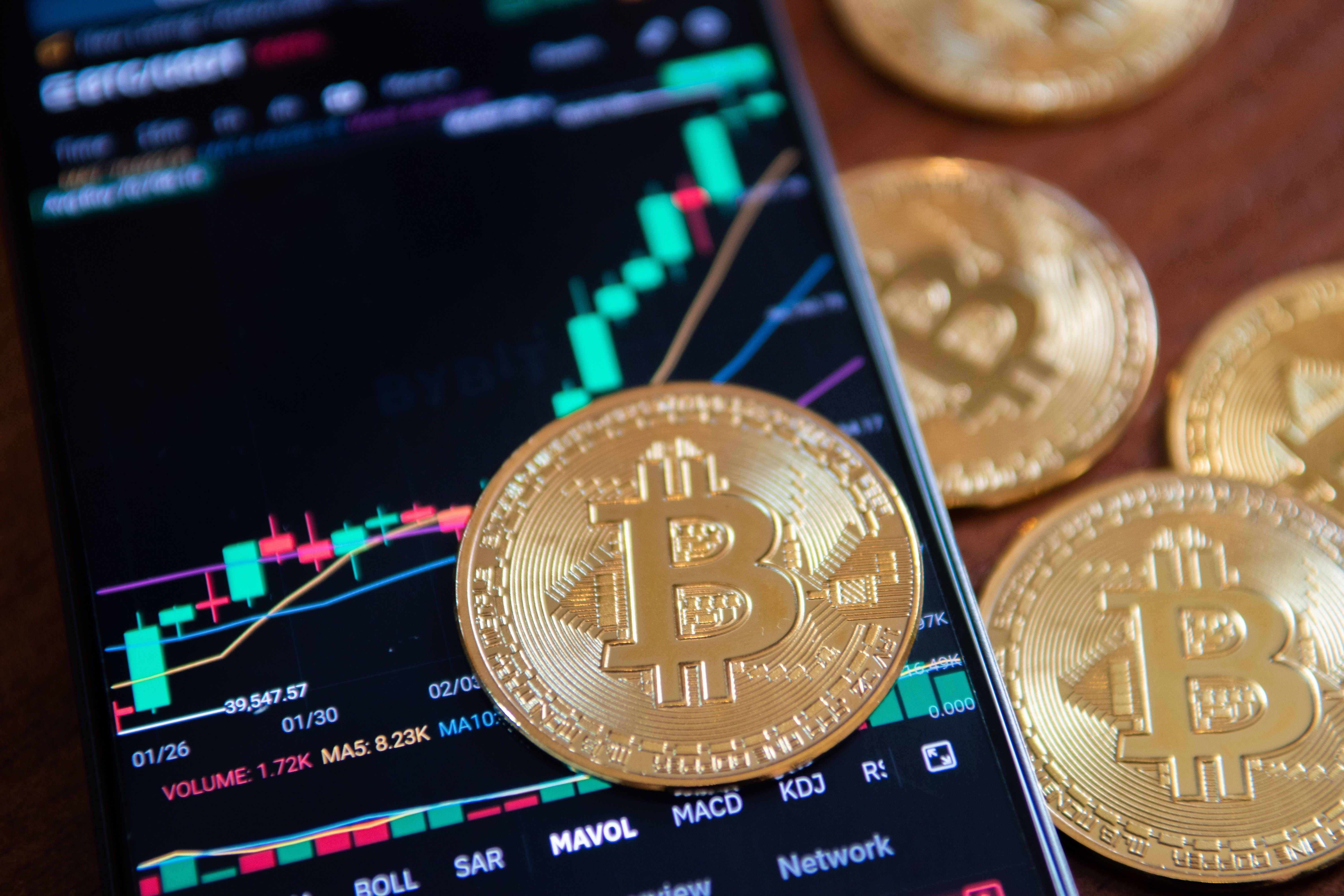 Growing,Bitcoin,With,A,Smartphone,With,The,Bybit,App,Open.