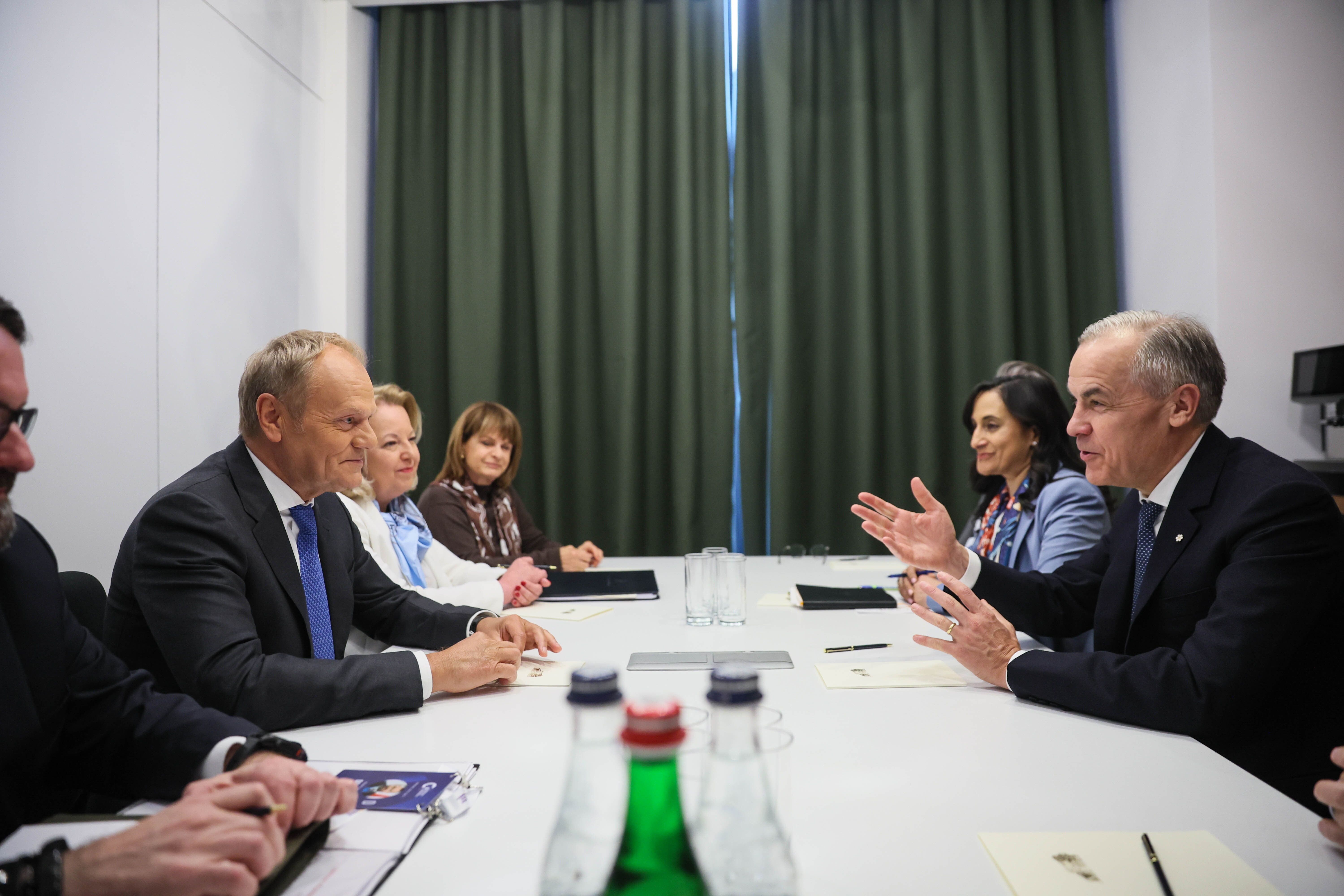 Donald Tusk, Mark Carney.