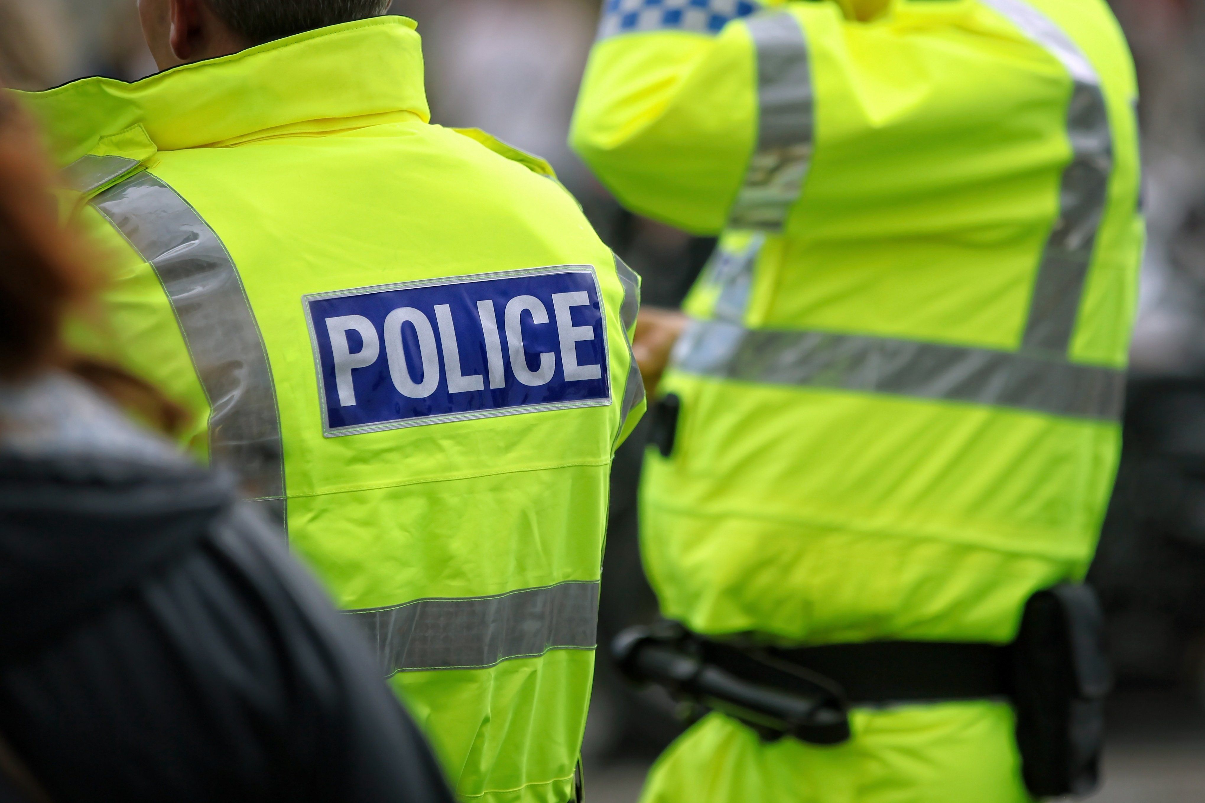 Police,Officers,In,Hi-visibility,Jacket,Policing,Crowd,Control,At,An