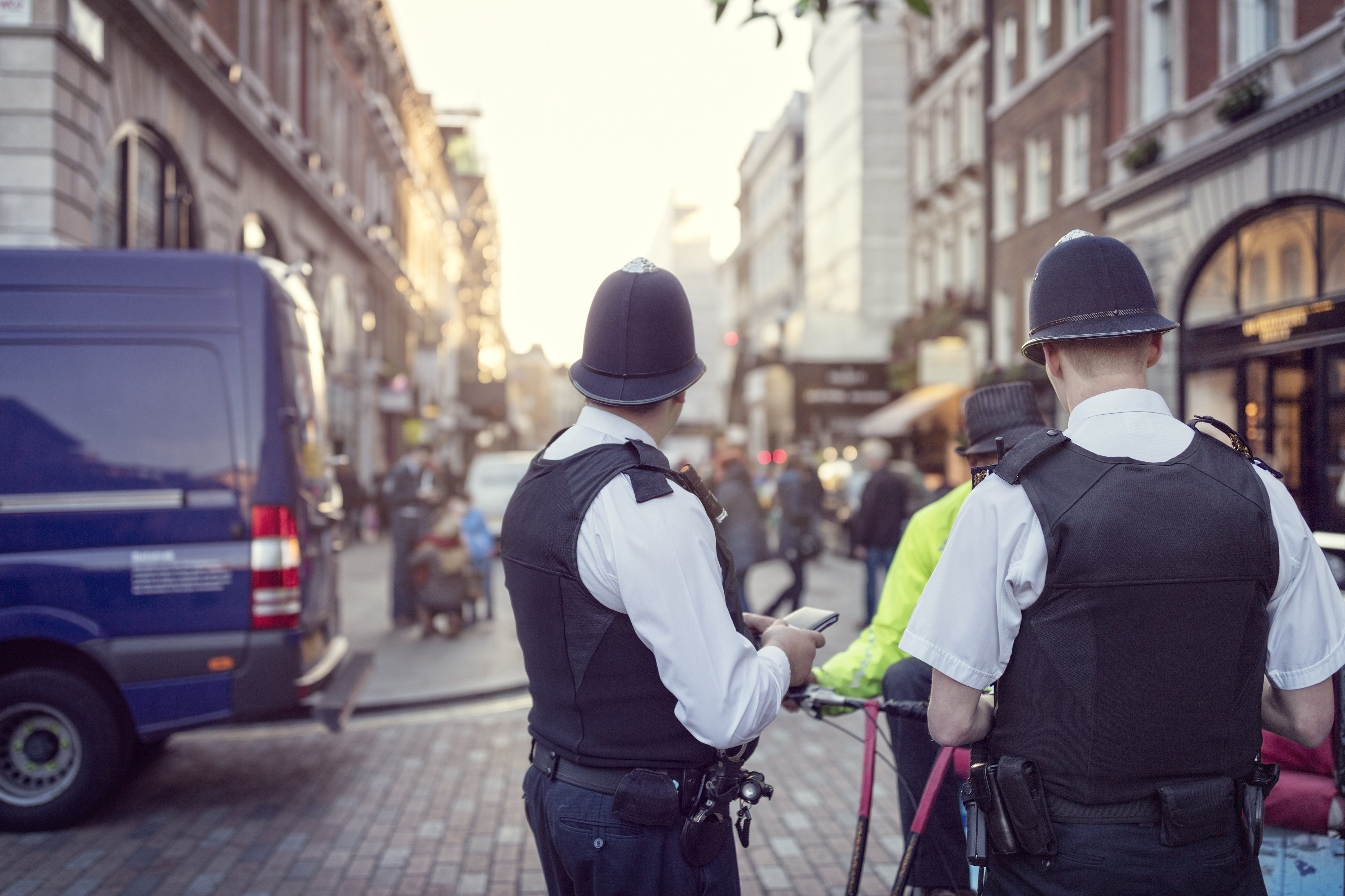 British,Police,Officers,In,Helmets,Policing,London,Streets