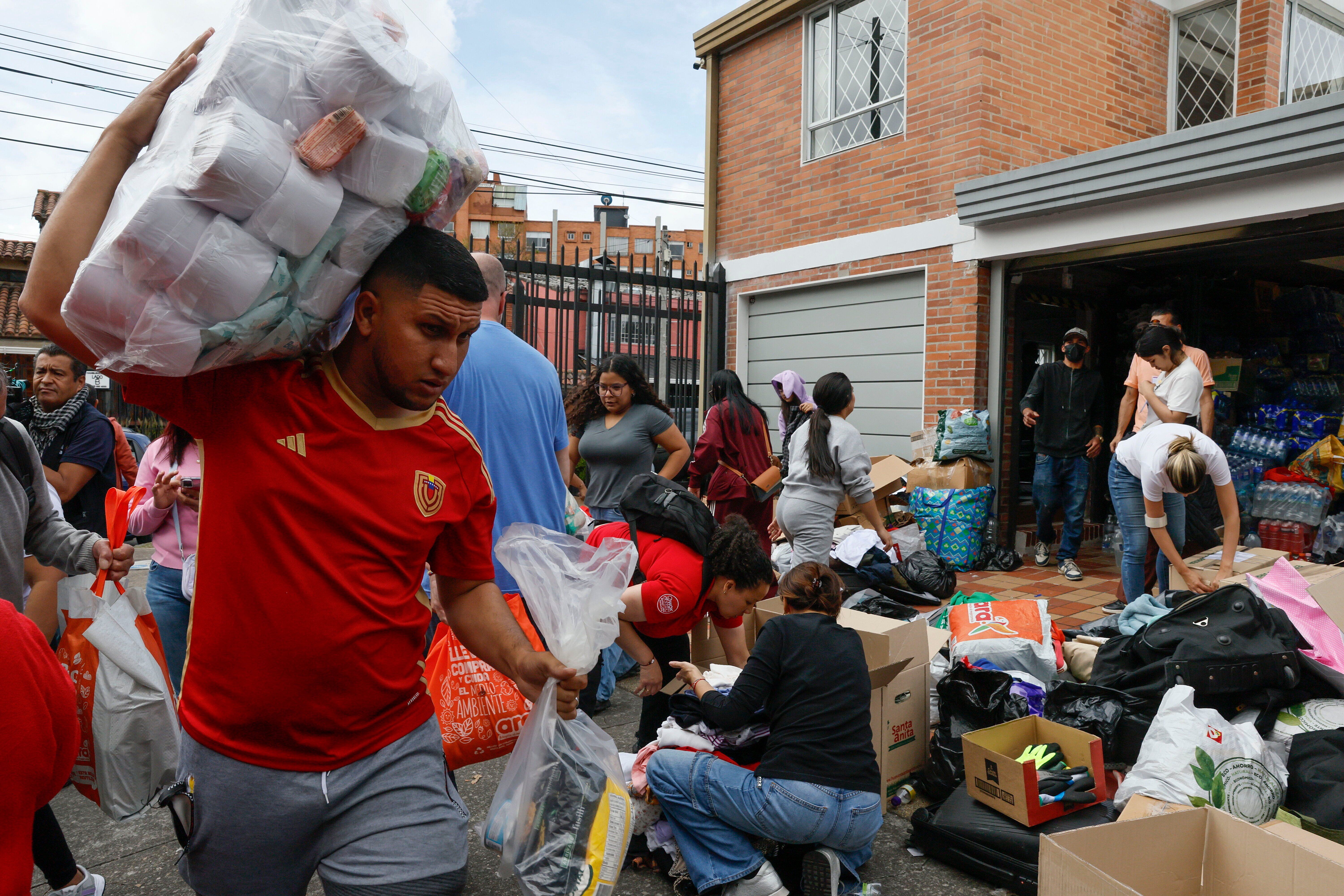 Volunteers in Bogota collect humanitarian aid to send to Venezuela after earthquakes
