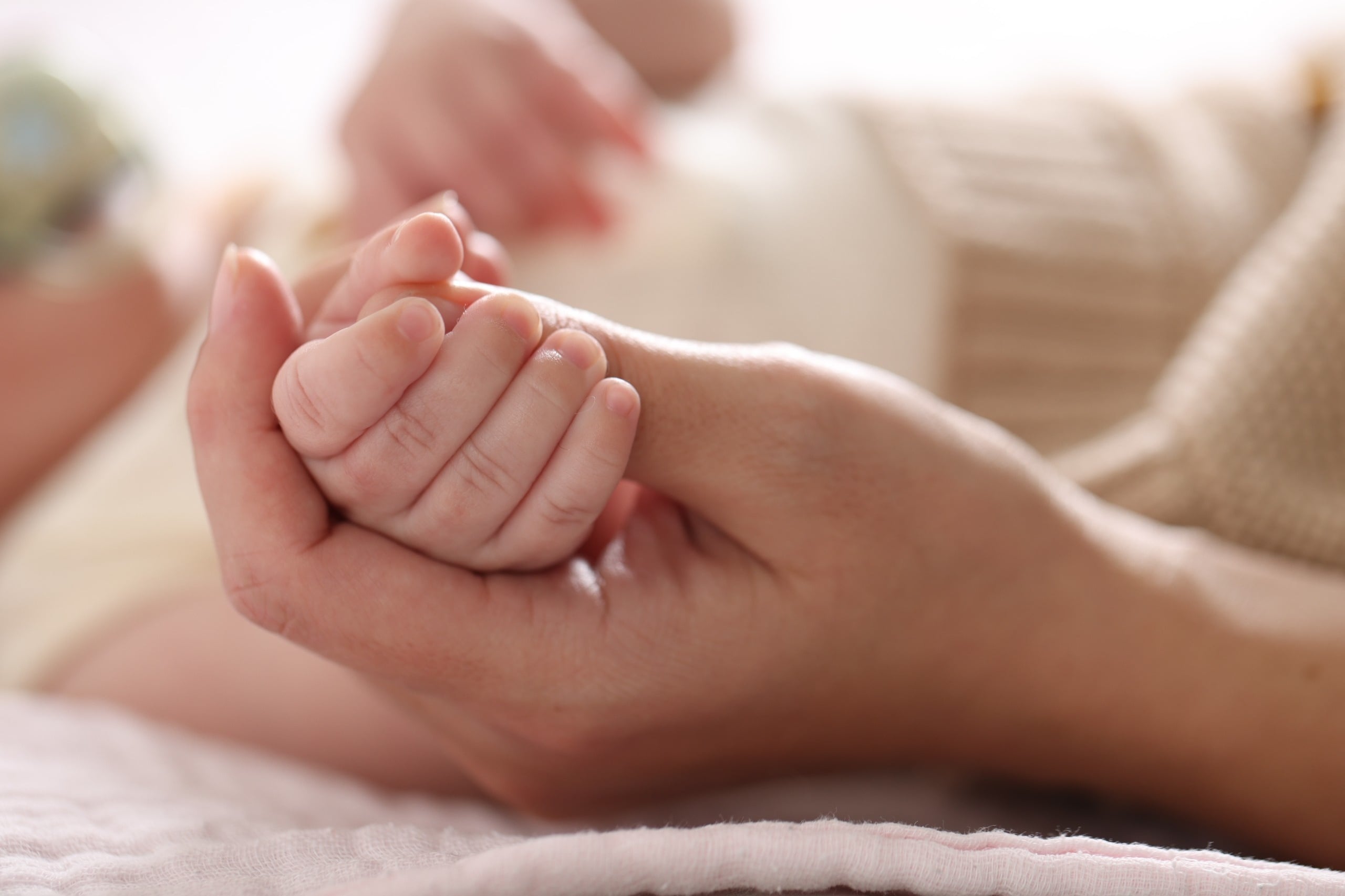 Mother,With,Her,Cute,Newborn,Baby,Indoors,,Closeup