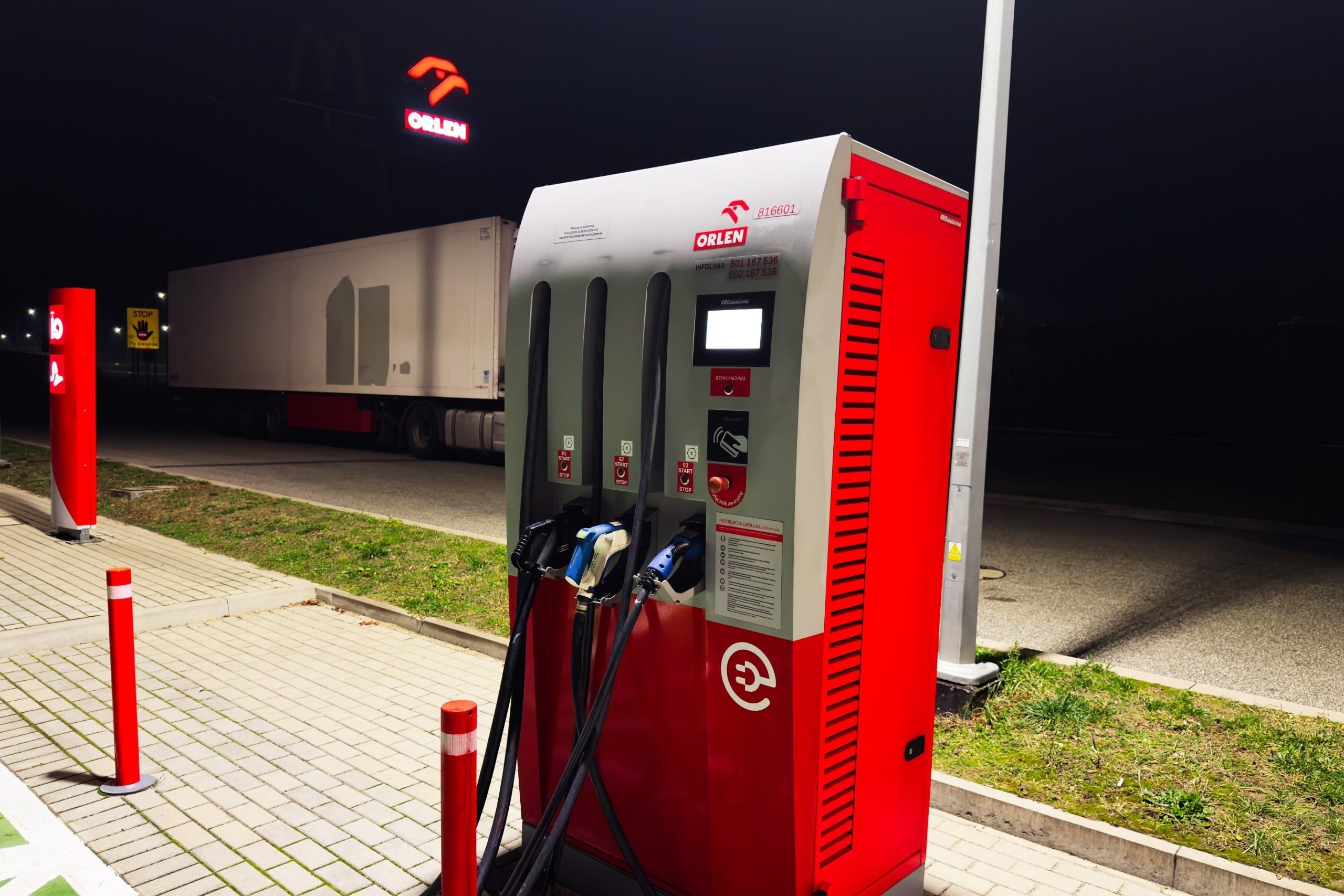 Krakow,,Poland,-,November,07,,2025:,Nighttime,Fueling,And,Charging