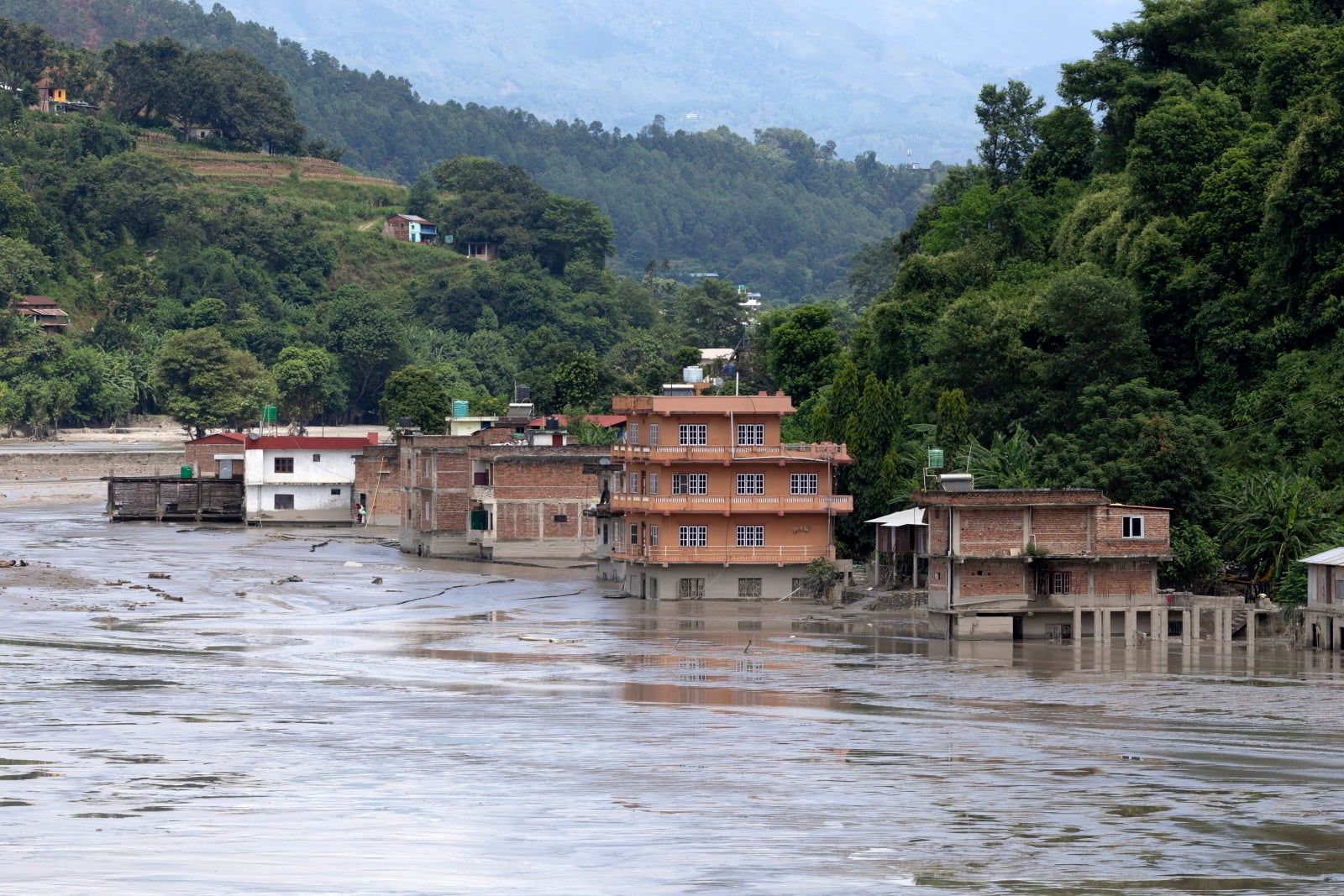 Devastation in aftermath of deadly Nepal-Tibet flash floods