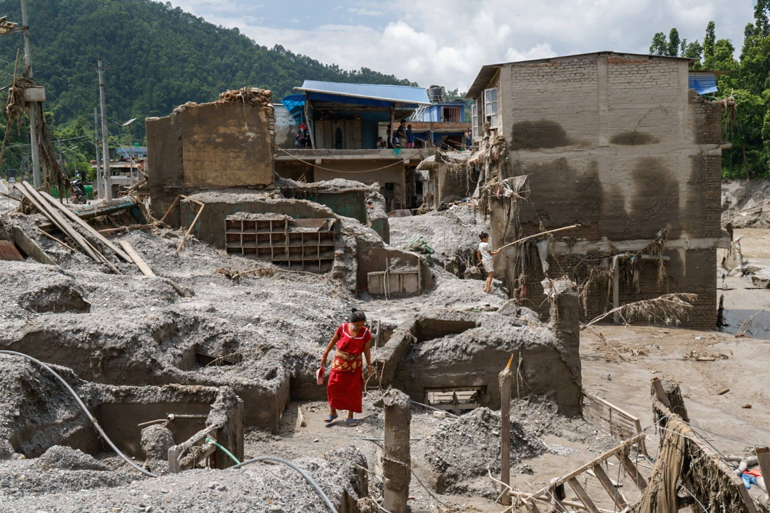 Devastation in aftermath of deadly Nepal-Tibet flash floods
