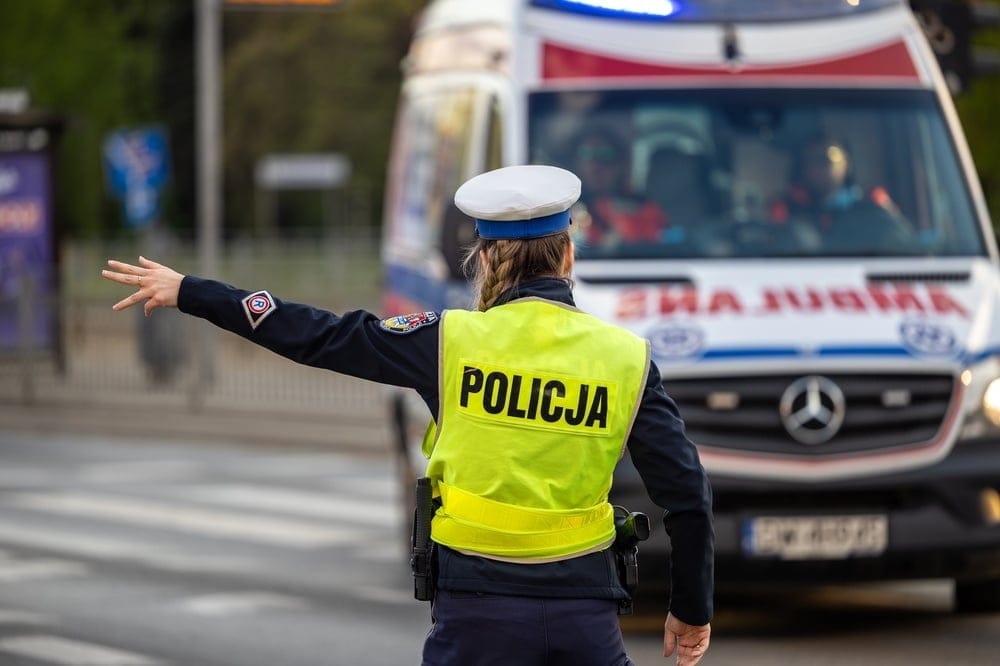 06.15.2026,Wroclaw,,Poland,,A,Traffic,Policewoman,Directs,Traffic,On,The