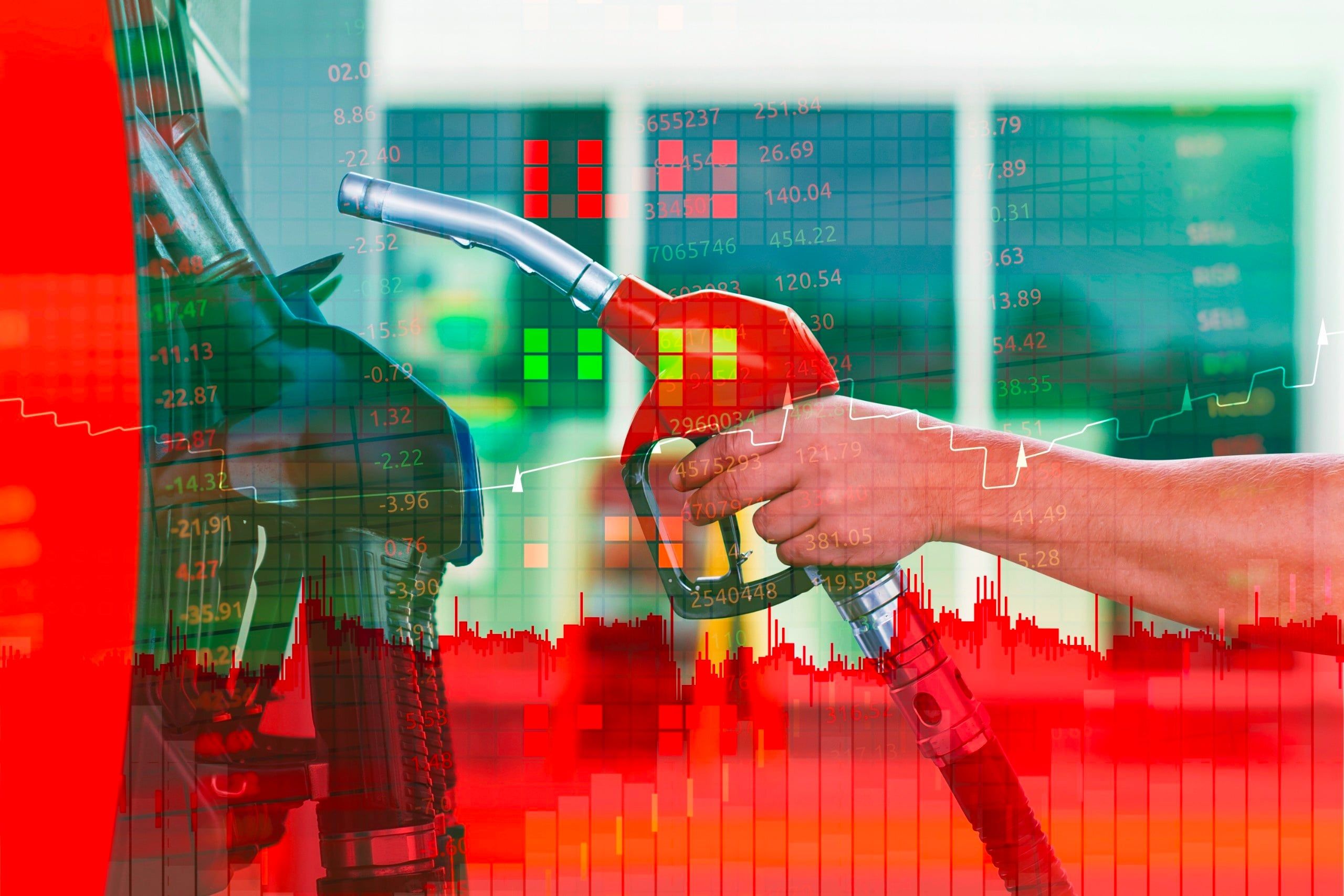 Person,Holding,A,Fuel,Nozzle,At,A,Gas,Station,With