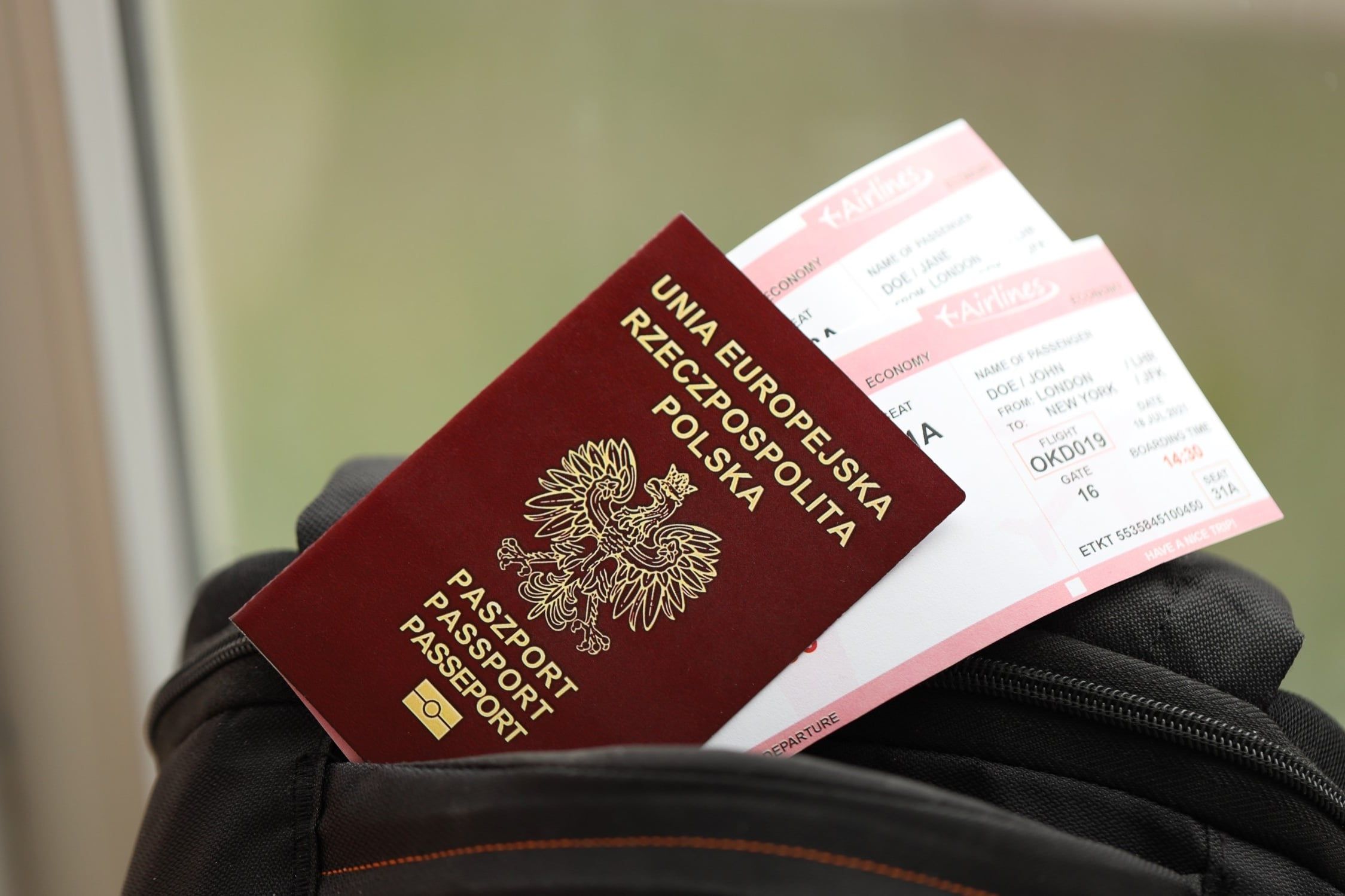 Poland,Passport,With,Airline,Tickets,On,Touristic,Backpack,Close,Up.