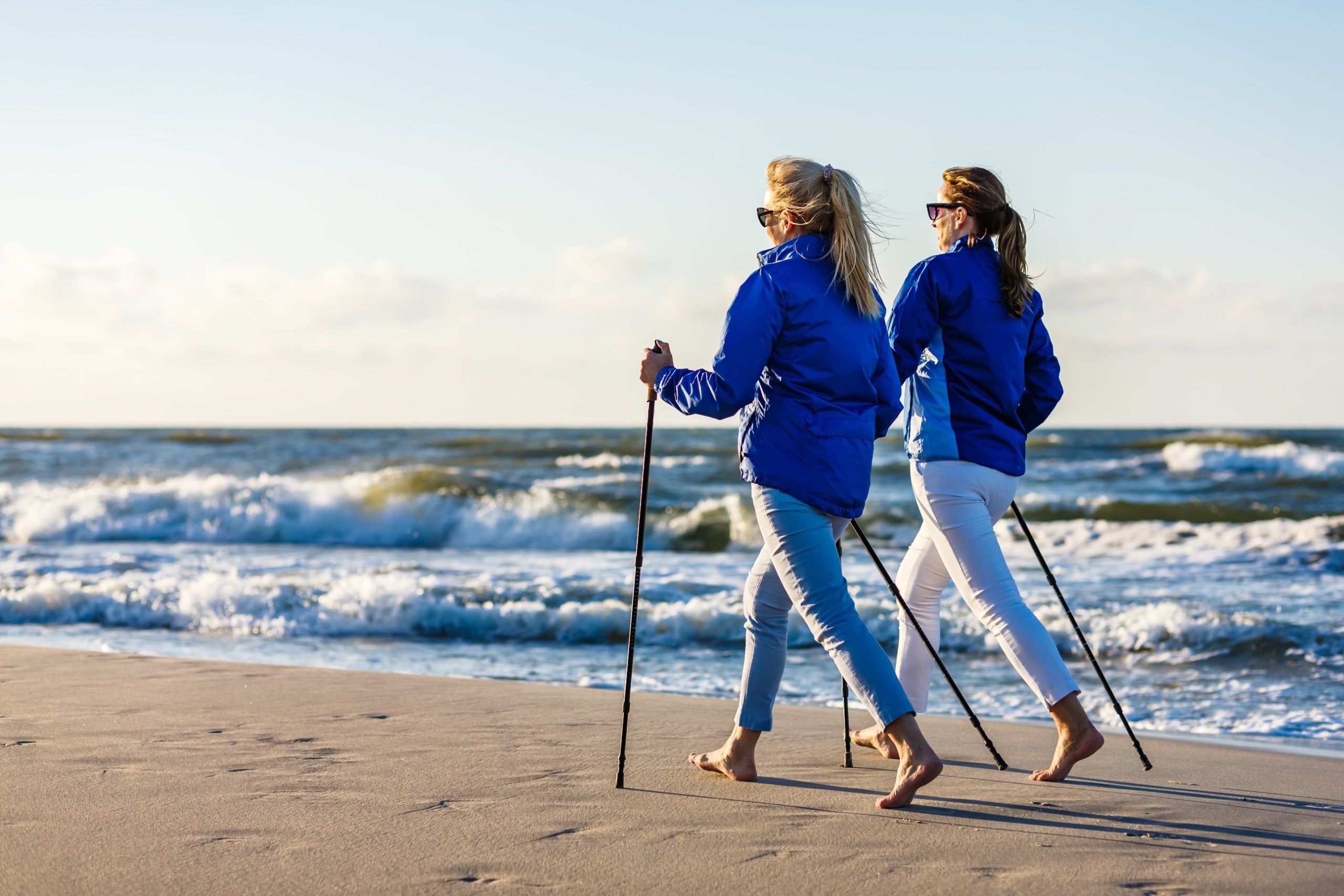 Nordic,Walking,-,Two,Women,Working,Out,On,Beach
