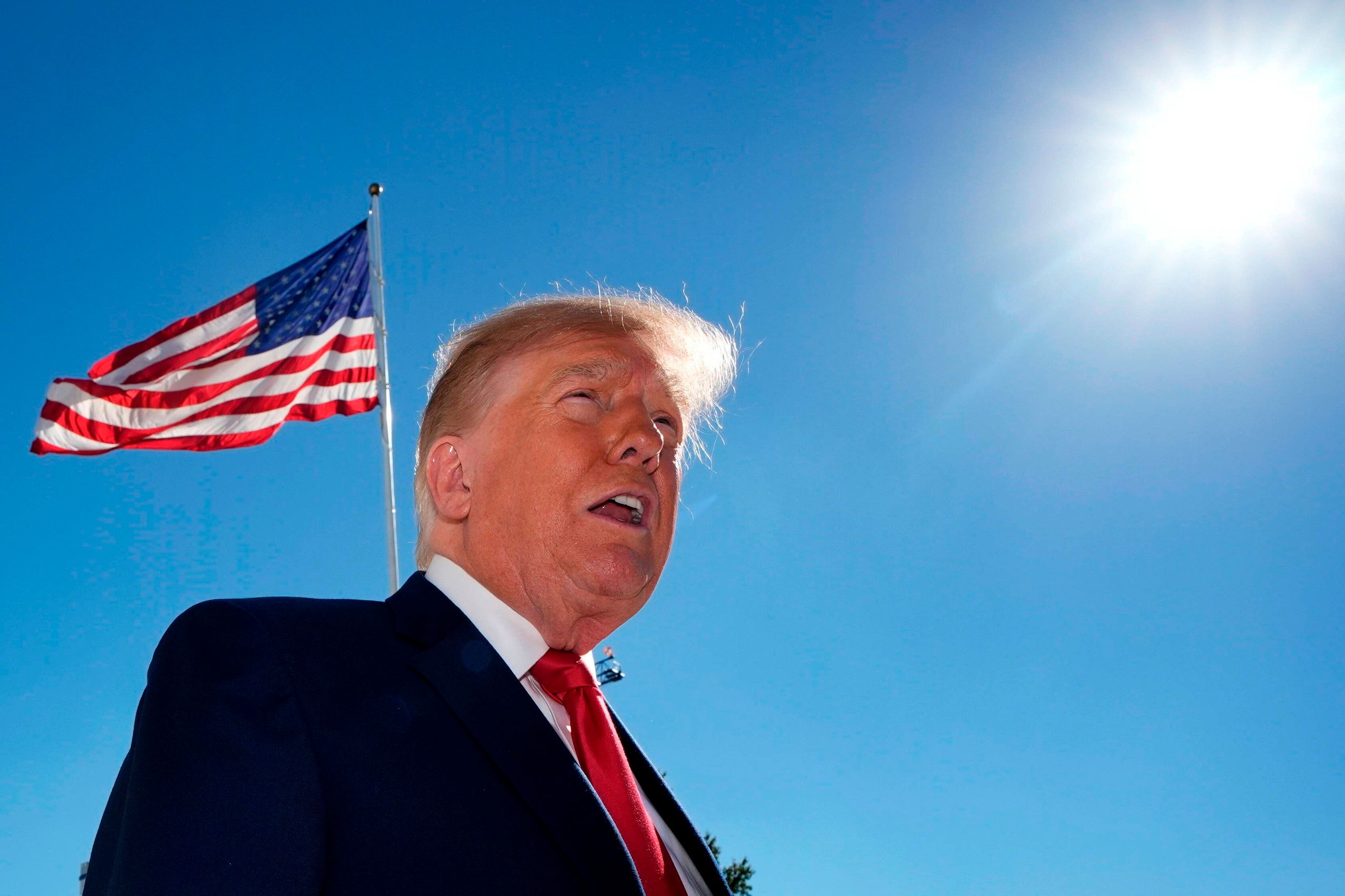 US President Donald Trump departs to Michigan