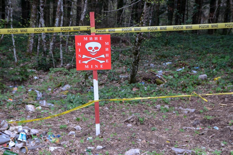 A,Minefield,Warning,In,The,Forest,Near,The,Frontlines.,Red