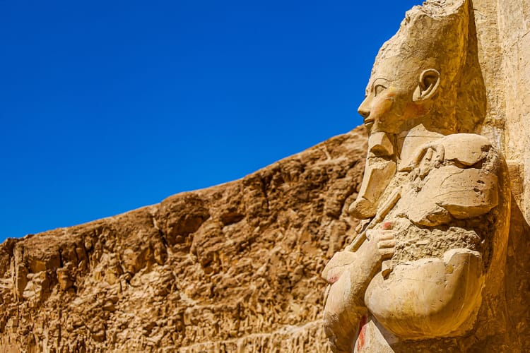 Ancient,Egyptian,Temple,Statue,Gazing,To,Nile,River