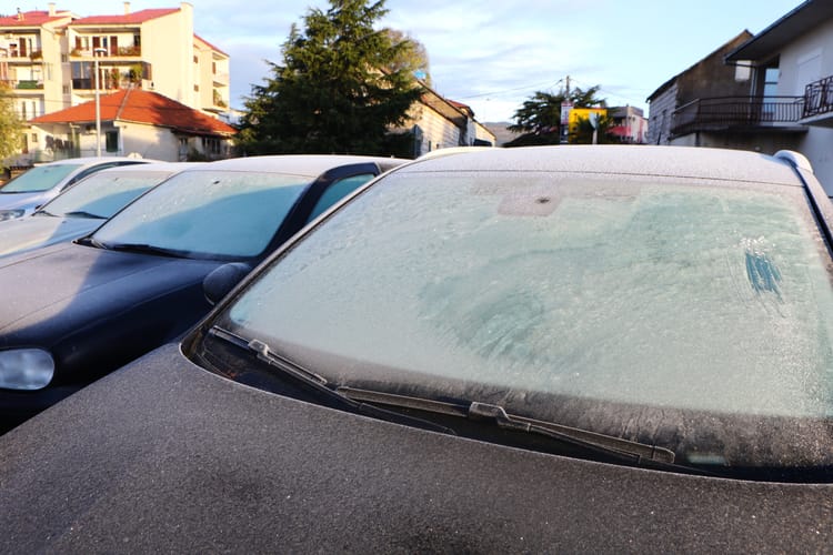 Low,Temperatures,Caused,Frost,On,Cars,,Windshields