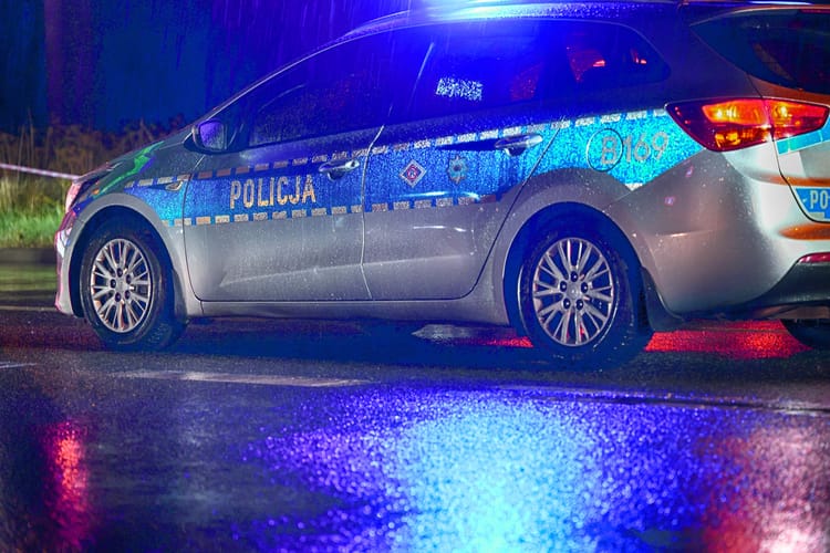 08.20.2023,Wroclaw,,Poland,,Police,Car,In,The,Evening,Rain.