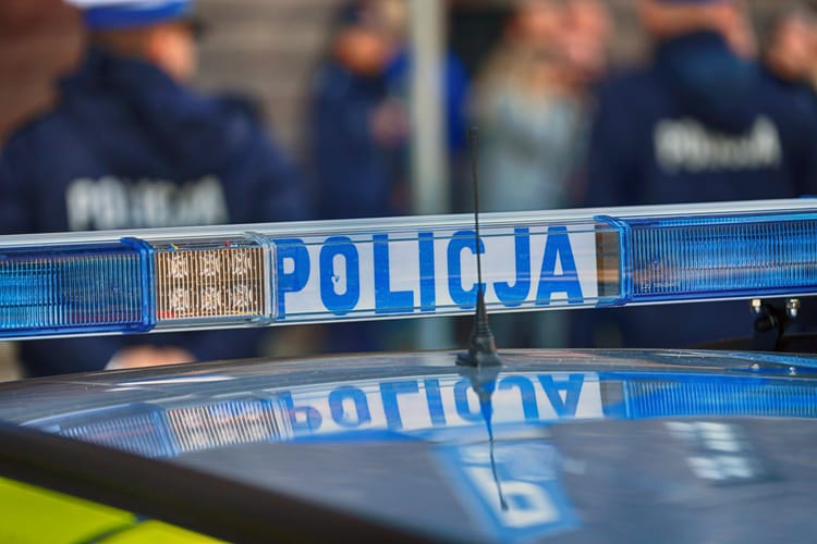 10.20.2024,Wroclaw,,Poland,,Blue,Flashing,Signal,On,The,Roof,Of