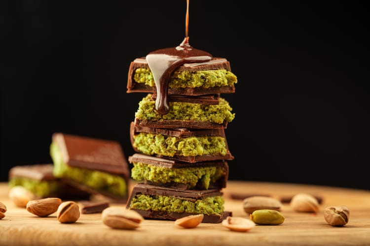 Dubai,Chocolate,With,Pistachio,Poured,With,Chocolate,On,Desk