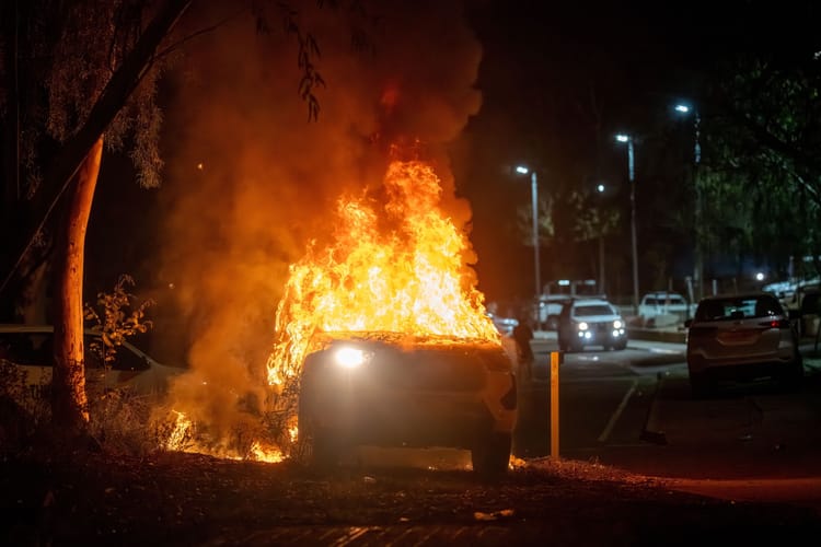 Riot erupts outside Alice Springs hospital after police arrest suspect in girl's death